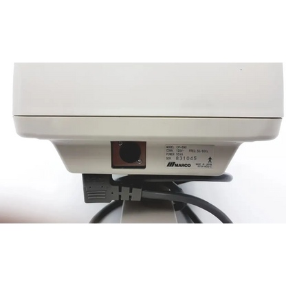 White plastic marco cp-690 auto chart projector showing black power cord and input port on the back side