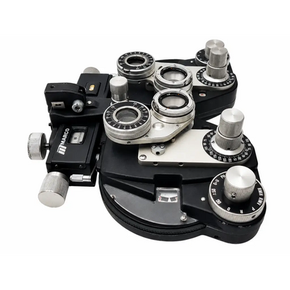 Black and silver marco rt-300 refractor biomed certified phoropter with multiple adjustable lenses and knobs for eye exams