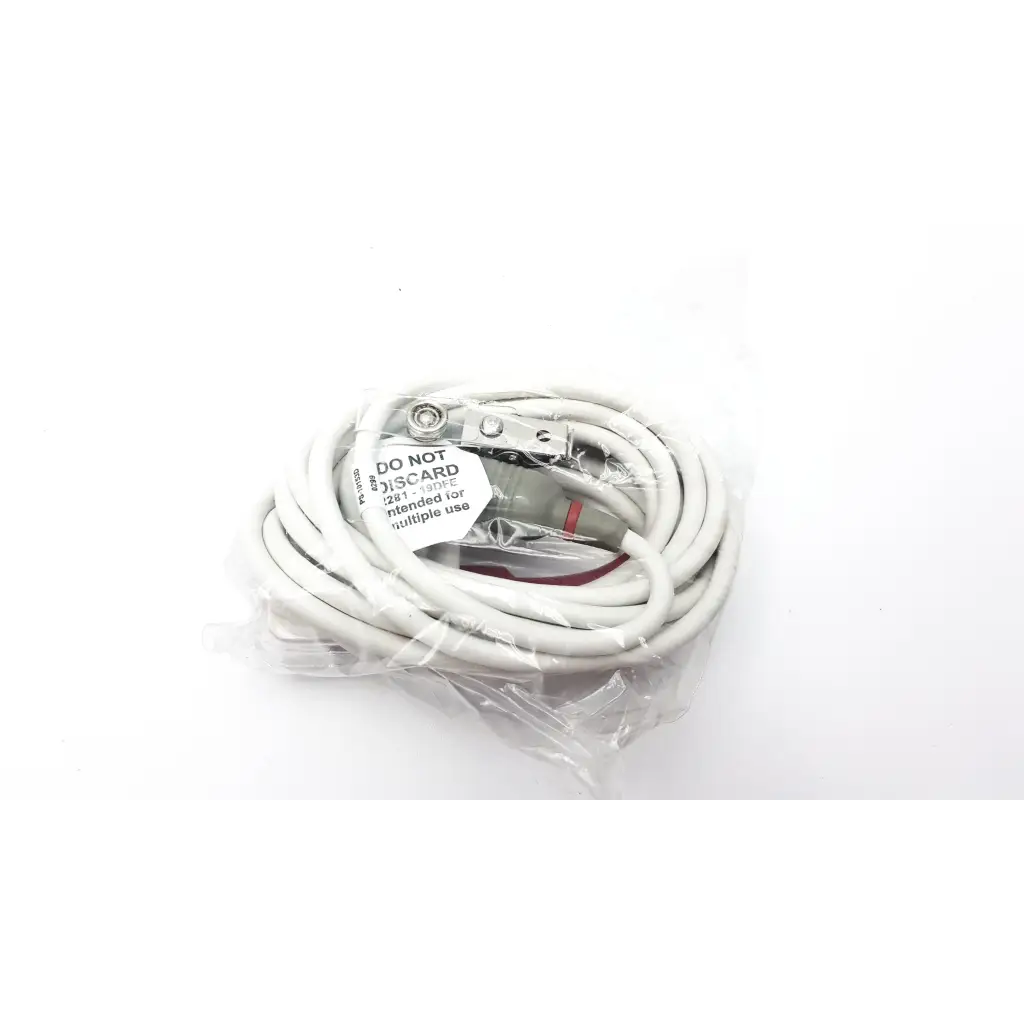 White coiled masimo lnc mp10 cable with metal clamps and label indicating not for disposal for medical use