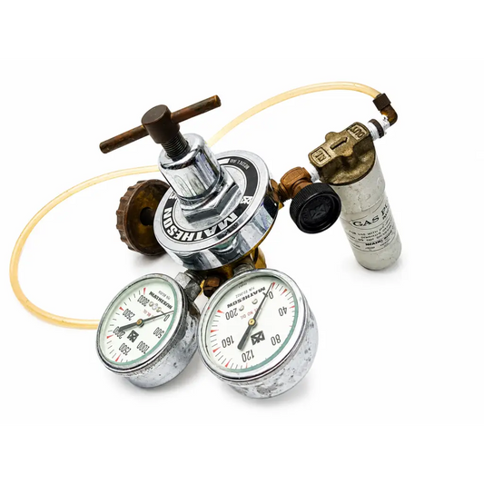 Matheson medical gas pressure regulator with chrome plating brass fittings two gauges and a black side knob for gas pressure control