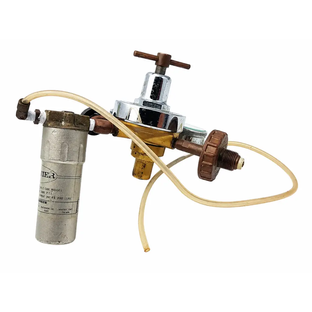 Chrome and brass matheson medical gas pressure regulator with cylindrical filter and translucent tubing for gas pressure control