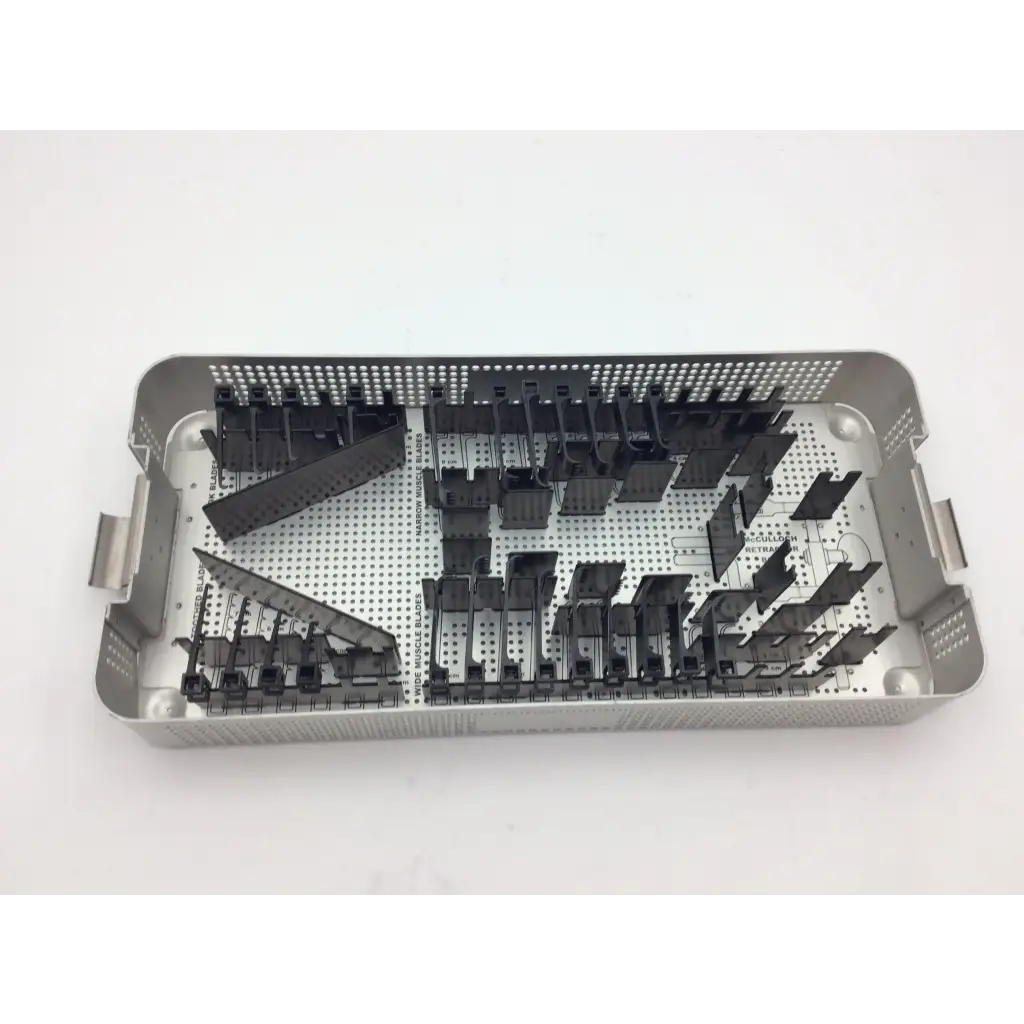 Silver mcculloch retractor instrument tray with black plastic organizers and perforated metal sides for surgical use