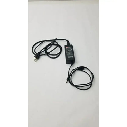 Black plastic mean well gs60a24-p1j power supply adapter with coiled cables and usb-c connector for versatile use