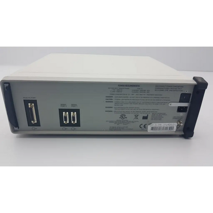 Beige mecta spectrum 5000q ect convulsive therapy stimulator rear panel with gray connectors and regulatory labels