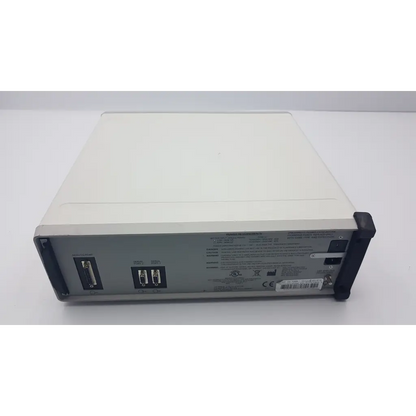 Cream-colored rectangular mecta spectrum 5000q ect convulsive therapy stimulator with matte finish and black protective corners