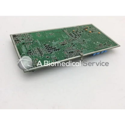 Green rectangular circuit board with silver edges and electronic components for medfusion syringe pump main use