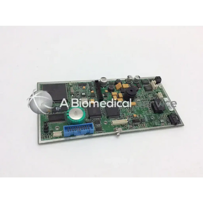 Green printed circuit board with black integrated circuits and blue connector for medfusion syringe pump main board pump main board