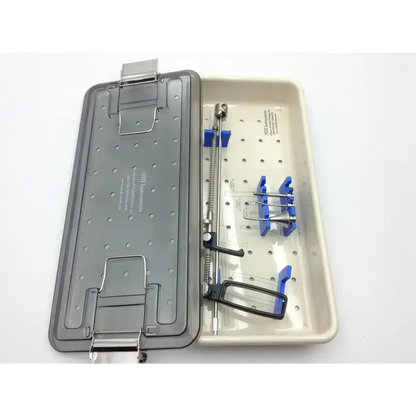 Gray plastic medical horizon instrument case with beige tray holding organized surgical tools germany set