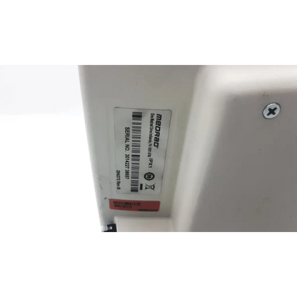 Medrad stellant rev b lcd display monitor showing white medrad dx1 ultrasound machine with serial label and red sticker