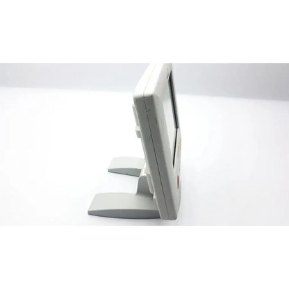 Medrad stellant rev b lcd display monitor featuring a white plastic nintendo game boy console with a rectangular screen and stand
