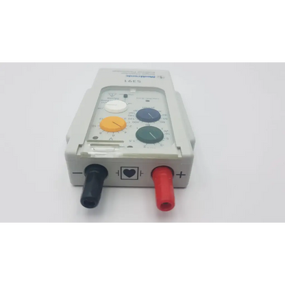 Gray plastic medtronic 5391 single chamber external pacemaker with colorful control knobs and red black electrode connectors