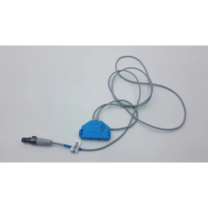 Blue plastic connector with gray cables and black-gray plug end on the back side of Medtronic 5391 single chamber external pacemaker