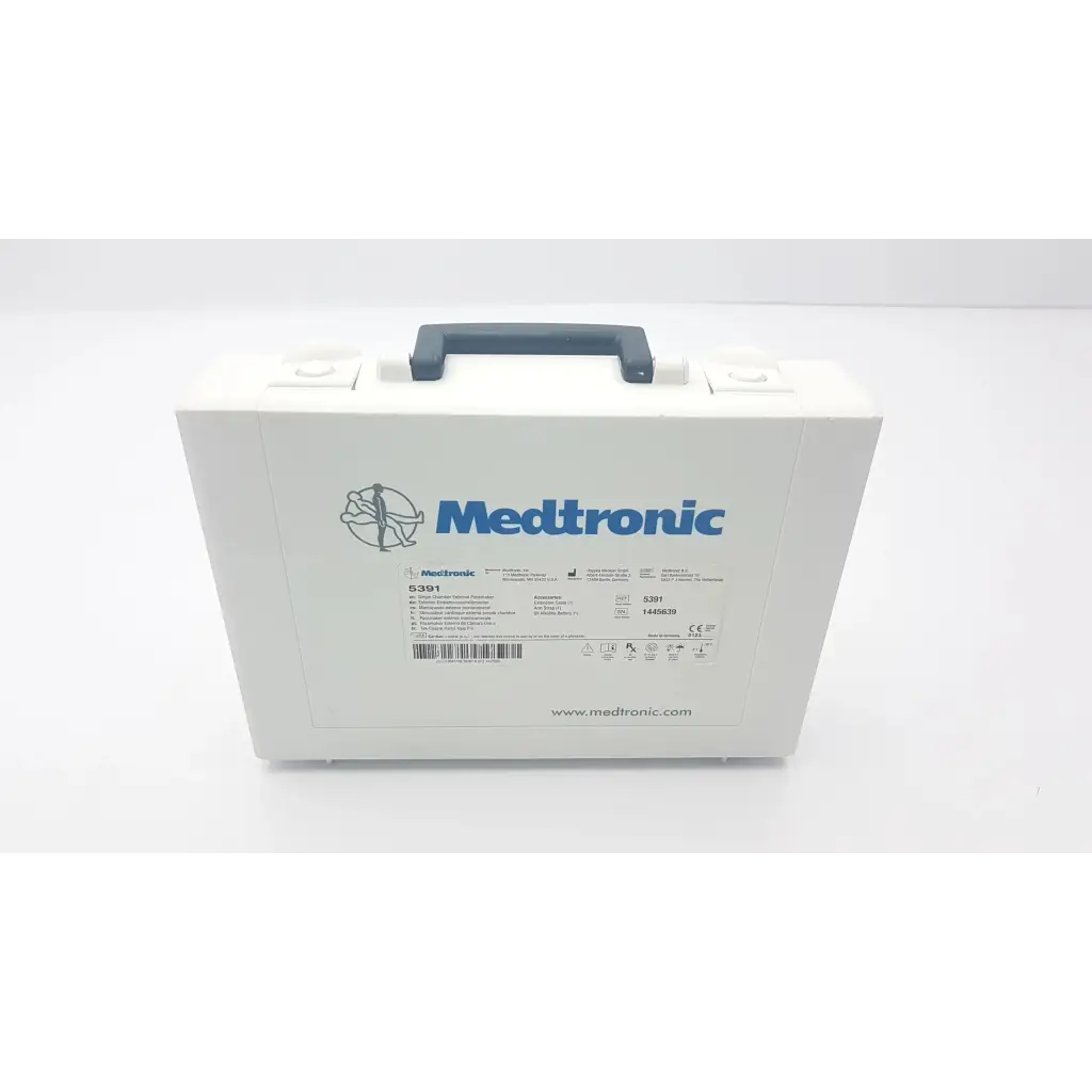 White medtronic 5391 single chamber external pacemaker with gray handle and blue branding medical case