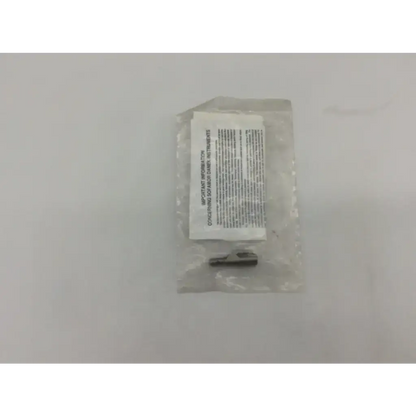 Medtronic 825-200 provisional clamp surgical stainless small metallic cylindrical clamp in clear plastic bag with label