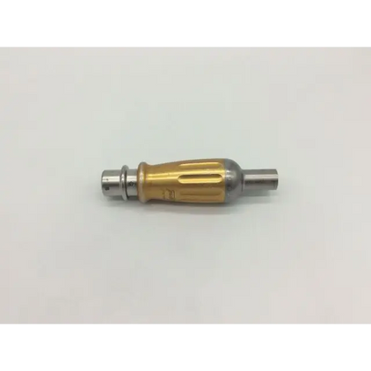 Medtronic midas rex ad03 perforator driver with gold and silver metallic body and textured grip section at 1000 rpm
