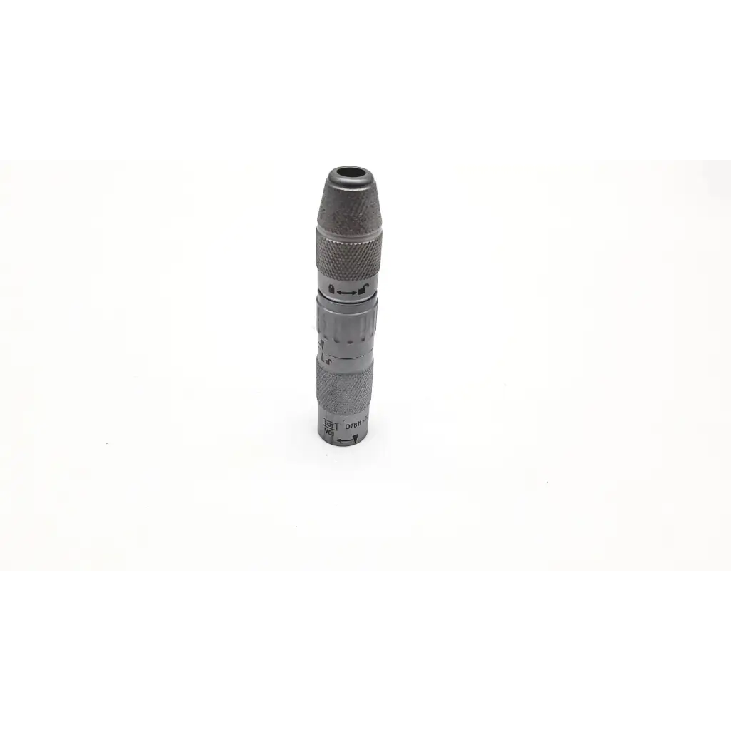 Gray metallic medtronic midas rex legend at10 telescoping attachment with textured grip and engraved markings