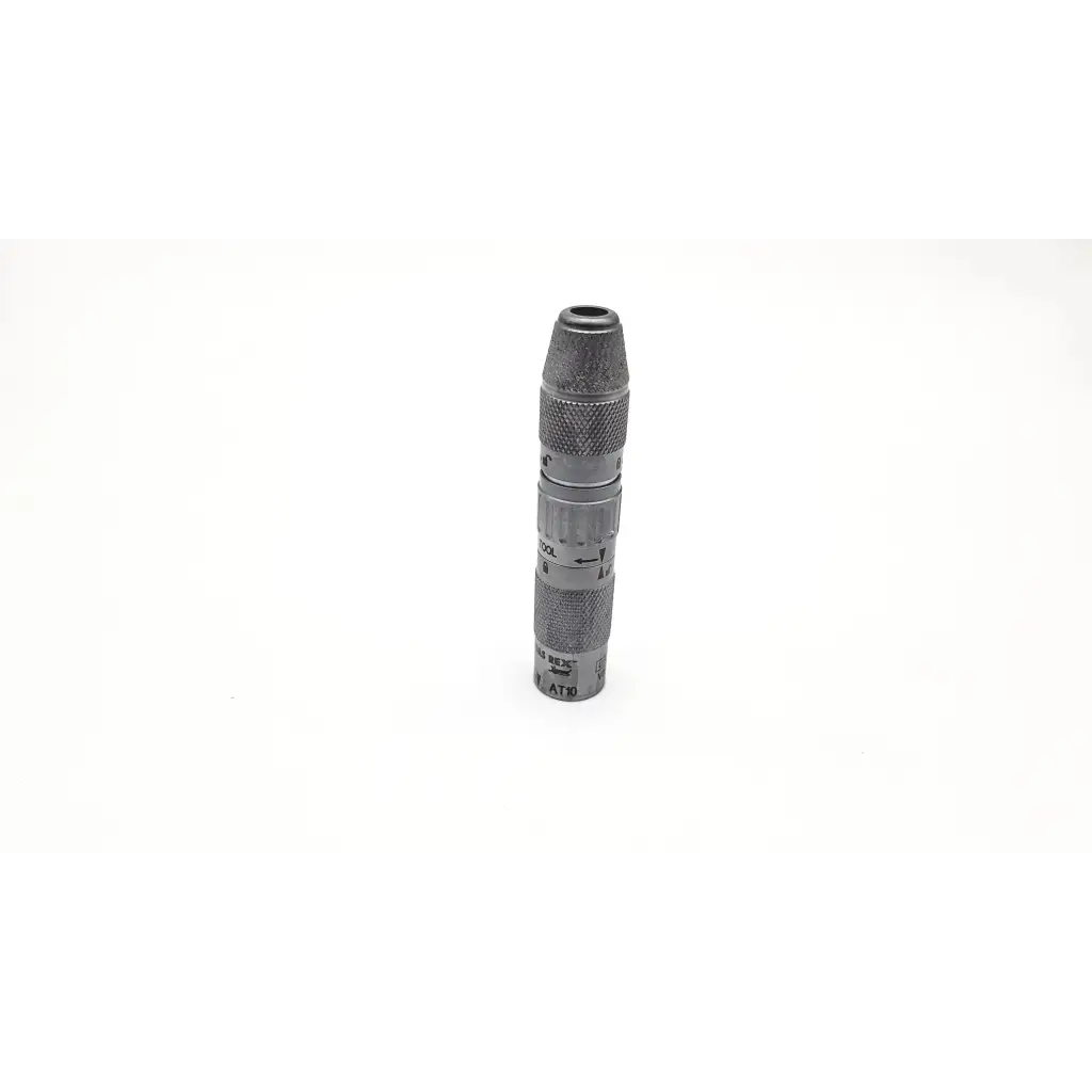 Gray metallic medtronic midas rex legend at10 telescoping attachment micrometer with textured grip and engraved markings