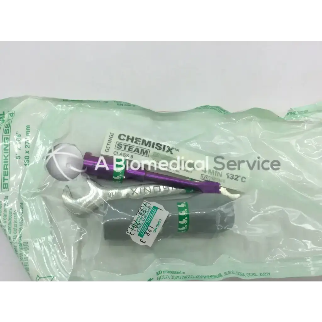 Medtronic misonix as0-x1 sonicone plus ultrasonic wound care magenta probe with purple and silver chemisix steam sterilization tool in green packaging