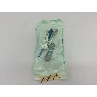 A sterile light green medical bag containing medtronic misonix sonicone plus ultrasonic copper probe with wrench and cover