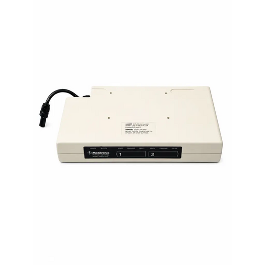 Cream-colored Medtronic Physio-Control LIFEPAK 12 power supply set with black control panel and attached power cord