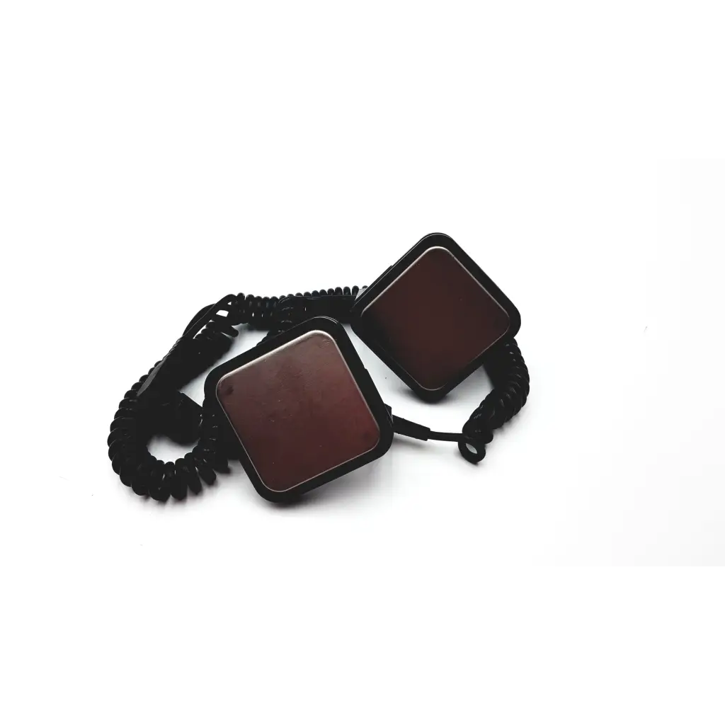 Black coiled cord with two dark brown square panels for medtronic physio-control sternum apex paddles defibrillator