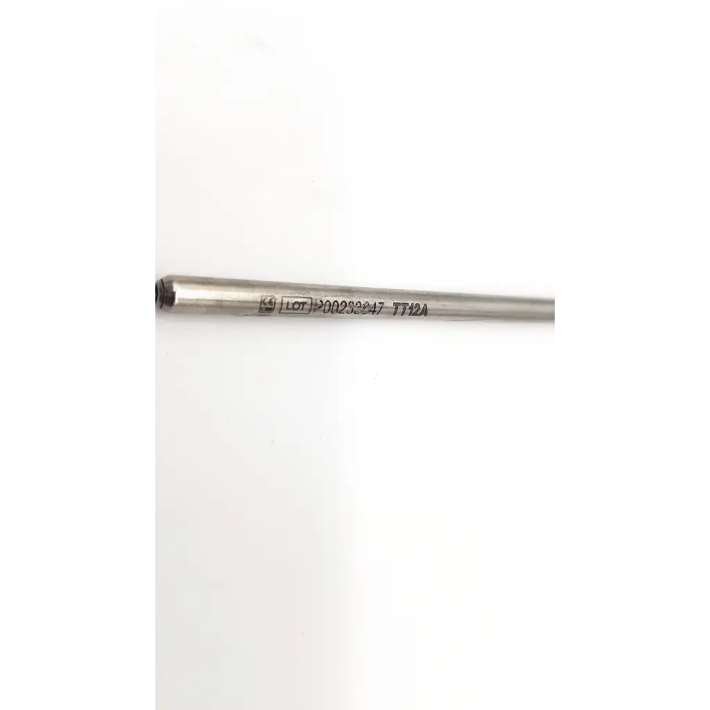 Silver metallic cylindrical rod with engraved lot number and model identifier from medtronic tt12a midas rex telescoping tube