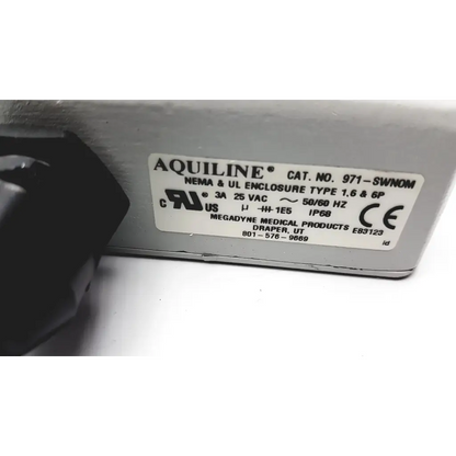 Silver metal industrial enclosure of megadyne aquiline 971-swnom bipolar footswitch with certification marks and specs