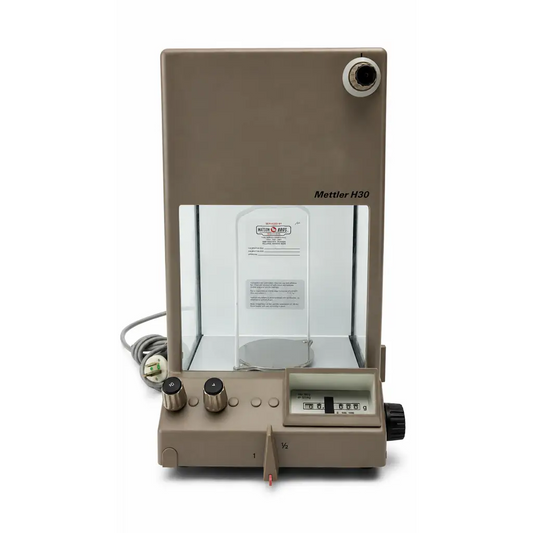 Beige mettler h30 analytical balance with transparent glass chamber and digital display