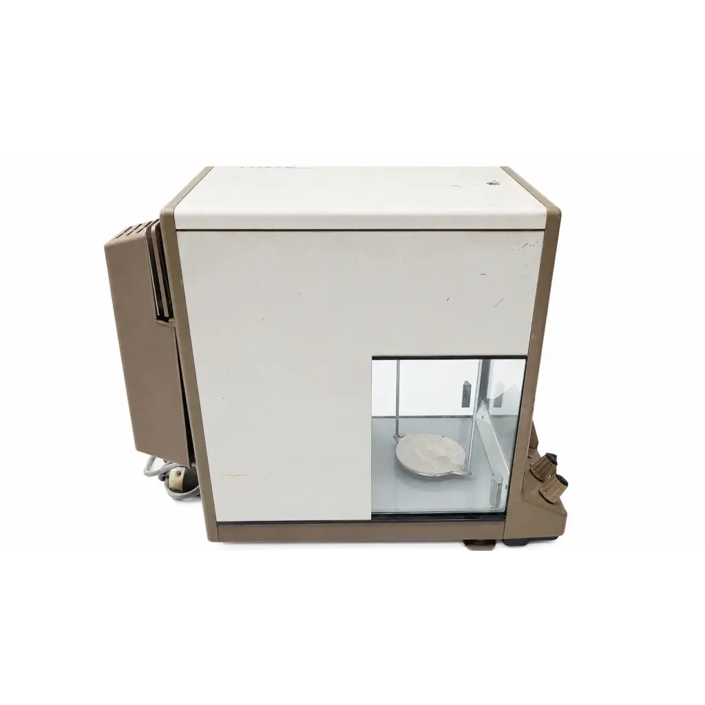 Beige and white mettler h30 analytical balance with transparent glass enclosure and circular weighing pan biomed certified