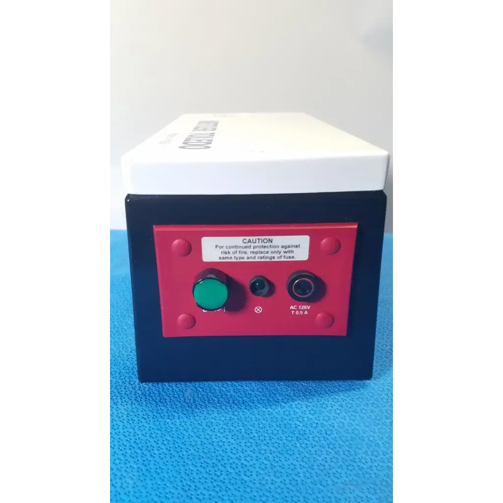Black and red mettler toledo haug en 8 slc power supply circuit breaker box with green push-button and ac 125v 10.5a label