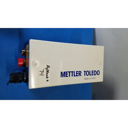 White rectangular mettler toledo haug industrial weighing scale with blue branding and red button for slc power supply use