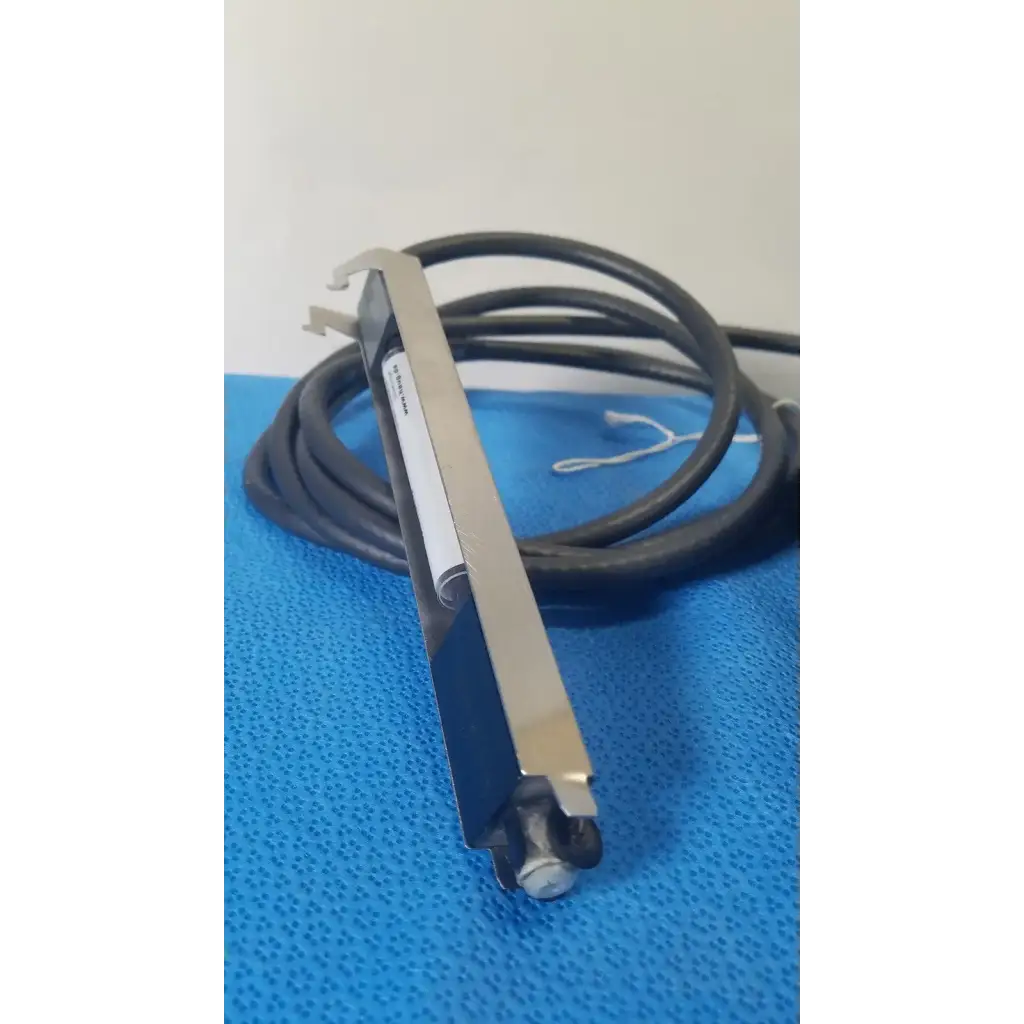 Silver metallic mettler toledo haug static eliminator bar system sensor with black coiled cable and white label
