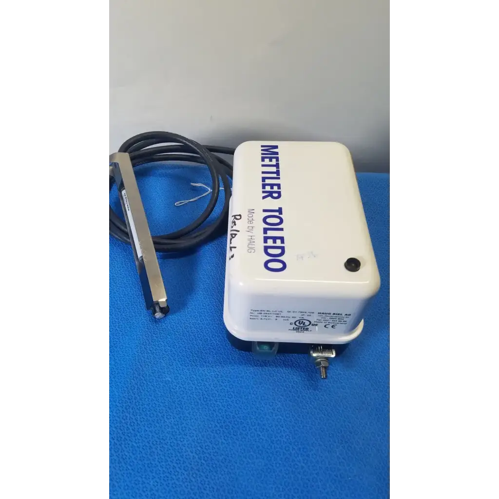 White rectangular mettler toledo haug static eliminator temperature controller with black coiled cable and metallic probe