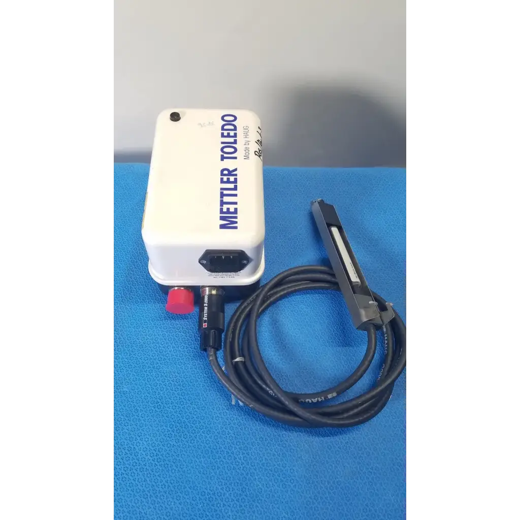 White mettler toledo haug static eliminator power supply with red button and black coiled cable for ionizing use
