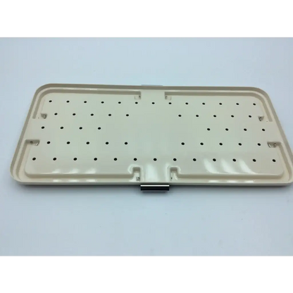 Beige plastic tray with a grid of holes and metallic clasp for micro-aire 81014 smartrelease ectr carpal tunnel set