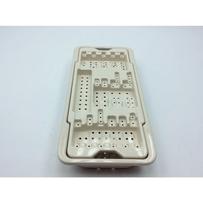 Beige plastic micro aire surgical instrument tray with multiple compartments and perforations for organized storage