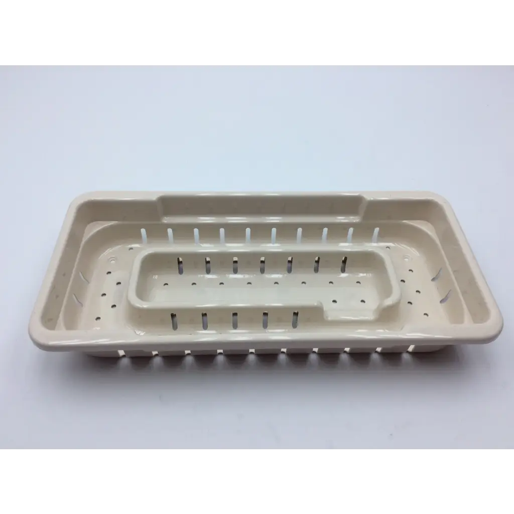 Beige plastic dish rack with multiple compartments and perforated sides for micro aire surgical instruments with 2x cases