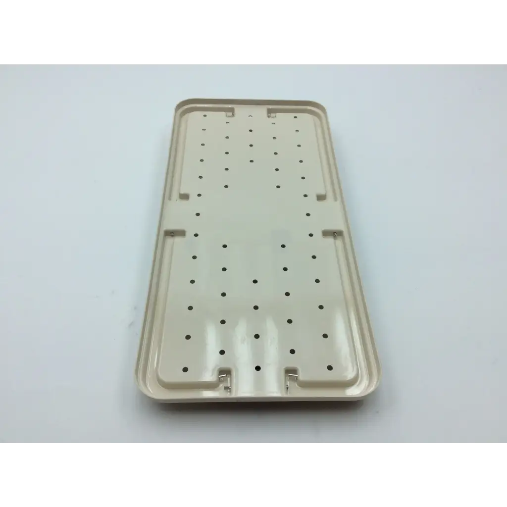 Beige plastic tray with perforations and raised edges for micro aire surgical instruments with 2x cases
