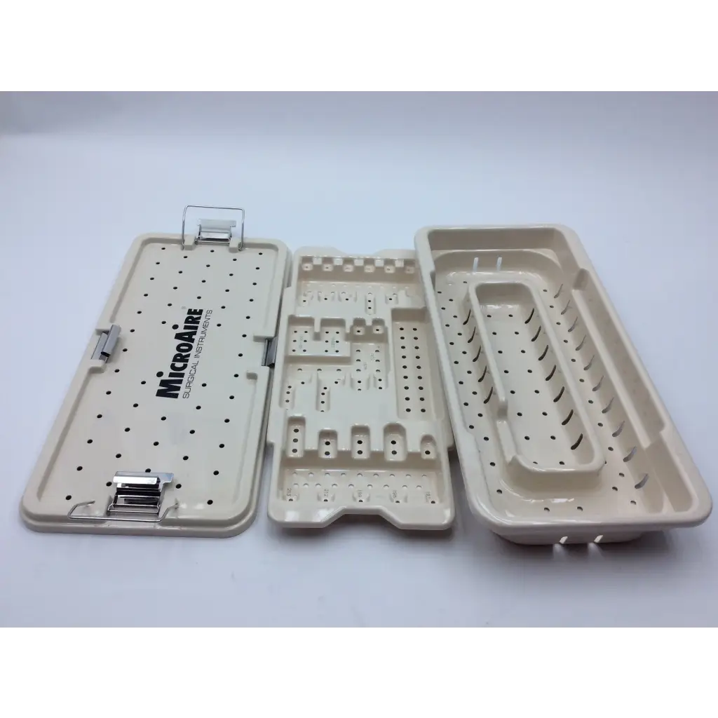 Beige plastic micro aire surgical instrument tray set with perforated design and molded compartments with 2 cases