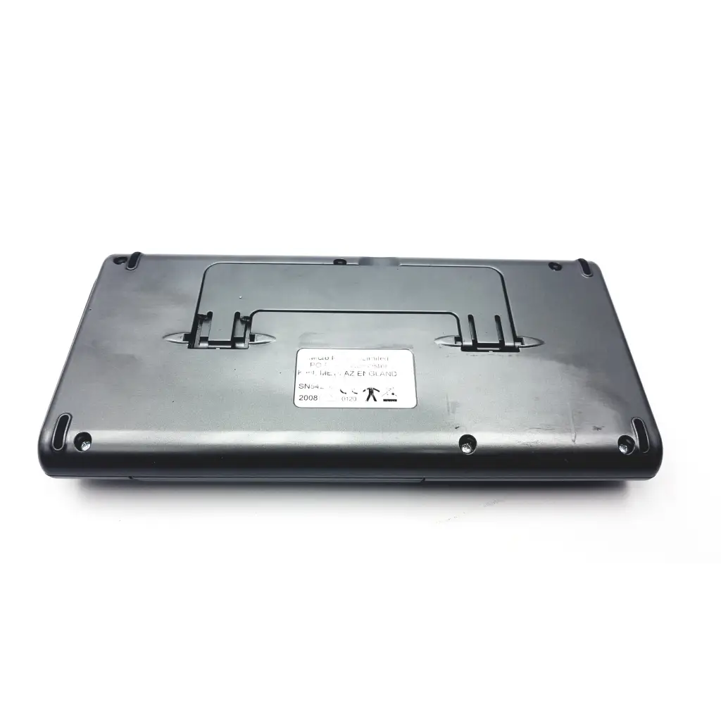 Black plastic laptop base with white label and integrated stand supports on micro direct microlab spida spirometer back side