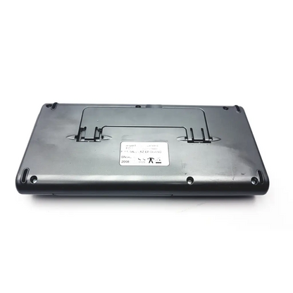 Black plastic laptop base with white label and integrated stand supports on micro direct microlab spida spirometer back side