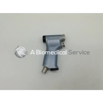 Gray ergonomic microaire 1641 smartdriver handpiece with metallic accents and black grip for surgical use