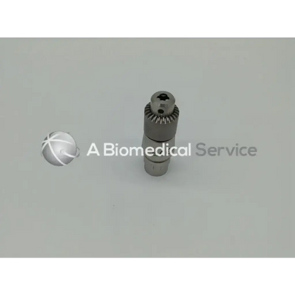 Silver metallic microaire 6680 jacobs chuck driver with gear teeth and hexagonal drive end for secure drilling