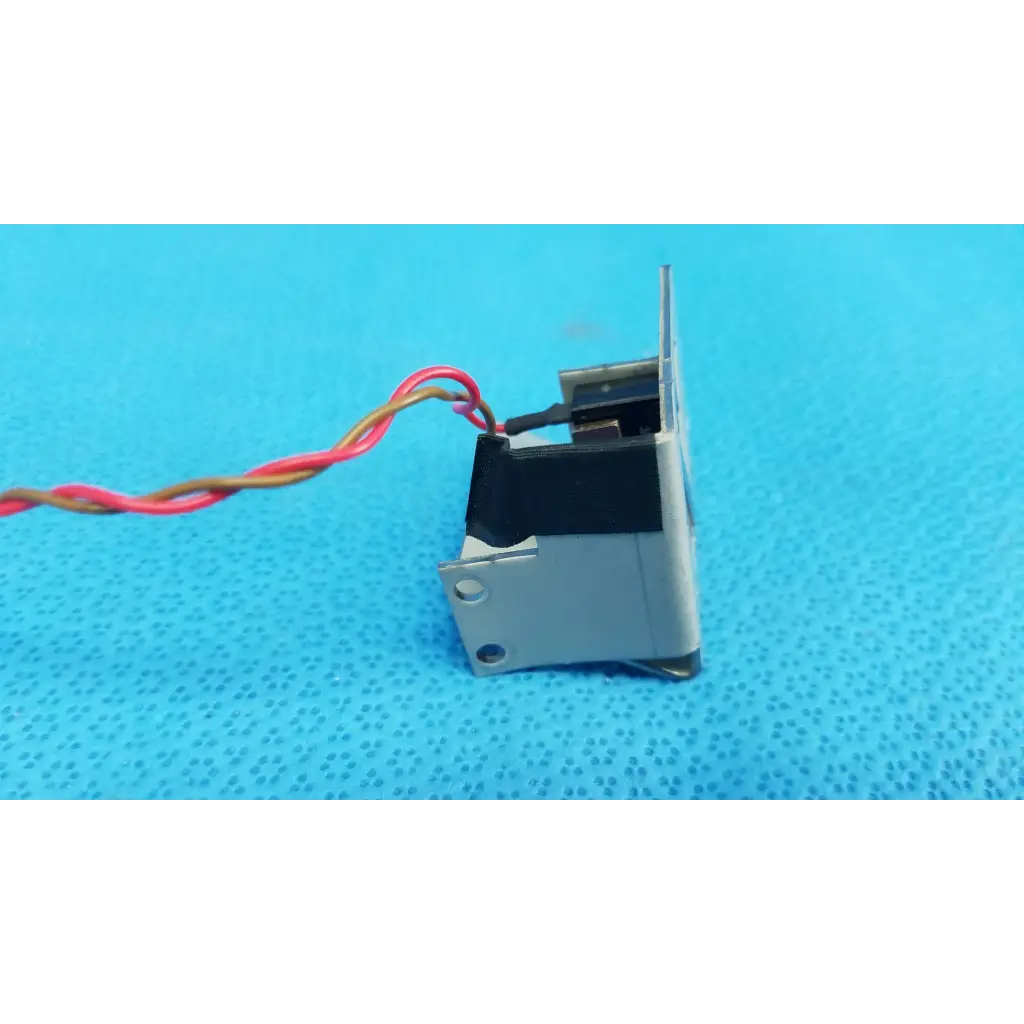 Silver metallic microswitch limit sensor bracket assembly with black section and red yellow wires for retinal camera