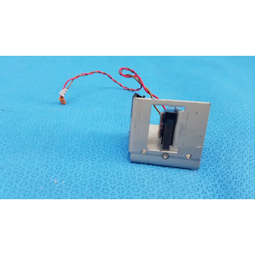 Silver metallic microswitch limit sensor with visible internals and red-white wire for retinal camera bracket assembly