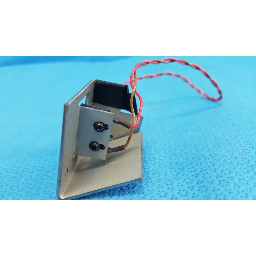 Silver metallic microswitch limit sensor bracket assembly with black screws and red-yellow wire for retinal camera trc-nw6s