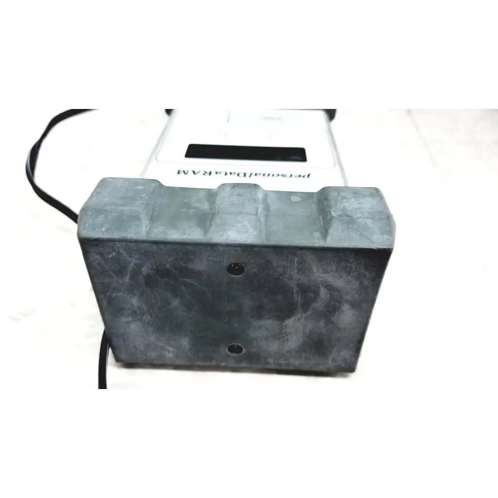 Dark gray textured plastic base with two holes and rectangular indentation for mie personal aerosol monitor accessories