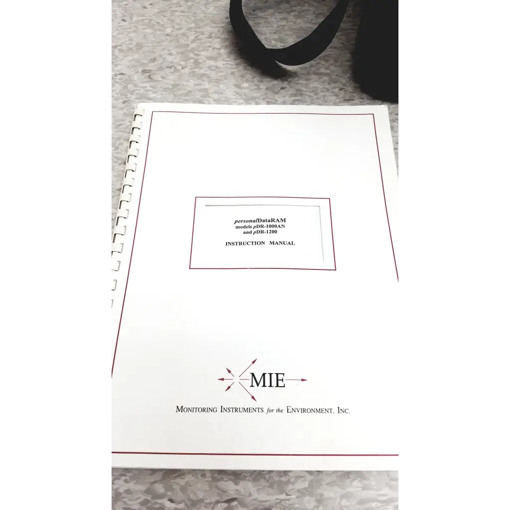 White spiral-bound instruction manual for mie personal data ram pdr-1086an and pdr-1200 aerosol monitor for industrial hygiene
