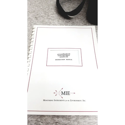 White spiral-bound instruction manual for mie personal data ram pdr-1086an and pdr-1200 aerosol monitor for industrial hygiene