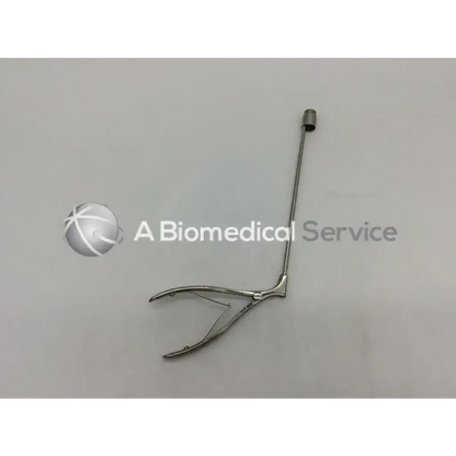 Silver mcgivney hemorrodidal surgical ligator with curved jaws and slender handle for precise surgical use